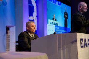 Andrés J. Gallegos, Esq. speaking at the podium at AAPD's 2015 Leadership Awards Gala