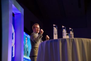 Keith Nolan speaking at the podium at AAPD's 2015 Leadership Awards Gala