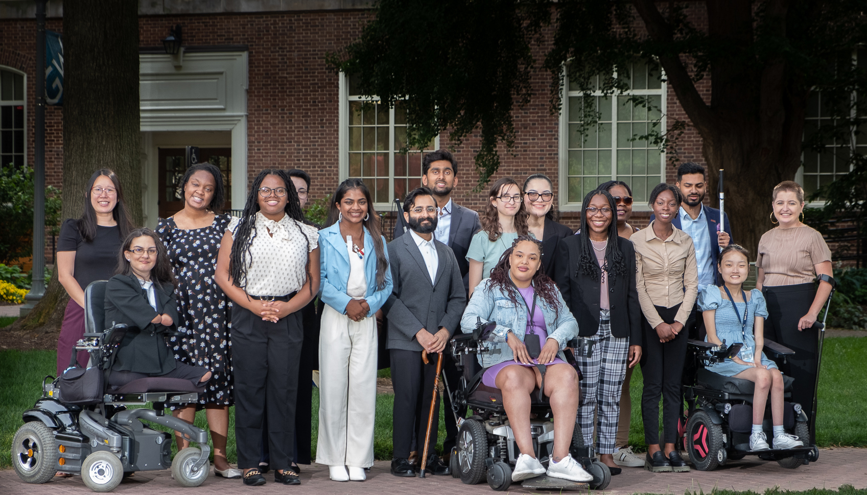 2023 AAPD Summer Interns In-person 2023 AAPD summer interns wearing business casual and posing for a group photo on George Washington University's campus