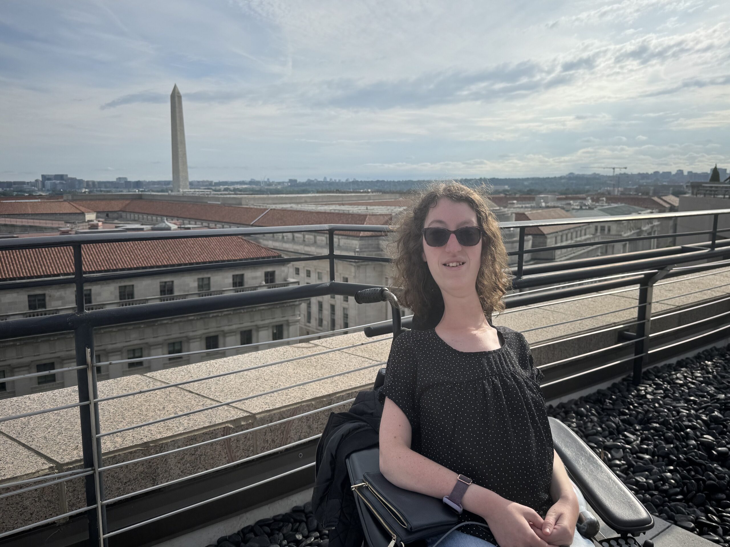Headshot of Naomi Hess on a rooftop in Washington, DC